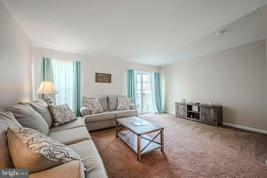 Price Reduced so make an offer! 
Welcome to your new move in ready, partially furnished home at the Villages at Millwood in Millsboro. This adorable condo/townhome has been recently updated with new flooring and carpet. The seller is also offering a $2000.00 credit towards appliances at closing!  The open-concept design seamlessly blends the kitchen and living area, creating a bright airy, space that's perfect for both everyday living and entertaining. The layout allows conversations and connections to flow effortlessly, whether you're preparing a meal or relaxing with guests. Ascend to the top floor and discover a haven of comfort and relaxation. This level boasts spacious bedrooms, each offering a private sanctuary for rest and rejuvenation. The primary suite offers built ins in the existing closet space and an en-suite bathroom. Two additional bedrooms are located on this level. With two full bathrooms at your disposal on this level, convenience is never compromised, ensuring everyone's needs are met with ease. Downstairs at the lowest level, a finished basement awaits, complete with a large storage closet that transforms the lower level into a versatile haven that can serve as an additional bedroom, a cozy den, or a bonus room tailored to your desires. This room also boasts a walkout to the backyard, and a laundry room with additional storage for bikes, etc. Flexibility and functionality seamlessly combine to accommodate your lifestyle needs in this partially furnished move in ready home. Enjoy the ease of nearby shopping amenities and the allure of being just a short drive away from the Delaware Beaches. Priced attractively at $269,000.00 with a $2000.00 appliance credit, this meticulously refreshed condo townhome presents an exceptional opportunity. Tour today!