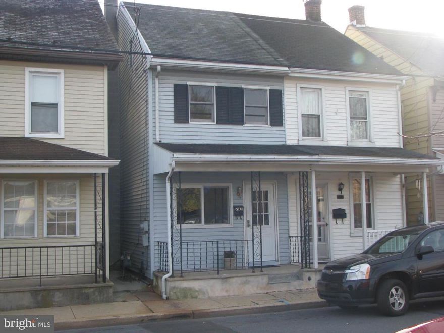 MOVE RIGHT INTO THIS FRESHLY PAINTED & REMODELED SEMI-DETACHED HOME. BRAND-NEW GAS FURNACE INSTALLED. IT FEATURES 2 BEDROOMS, 1 FULL & 1 HALF BATHS, LIVING ROOM, EAT-IN KITCHEN, FIRST FLOOR LAUNDRY & WALK-UP STAIRS FOR ATTIC STORAGE.  NEW CARPETING, CERAMIC TILE FLOORS & TILT-IN WINDOWS. OVERSIZE 14X31 BLOCK GARAGE WITH AUTO DOOR OPENER, BUILT IN 1980. CHAIN-LINK FENCED YARD, FRONT & REAR ROOF-COVERED PORCHES. FULL CONCRETE BASEMENT FLOOR.