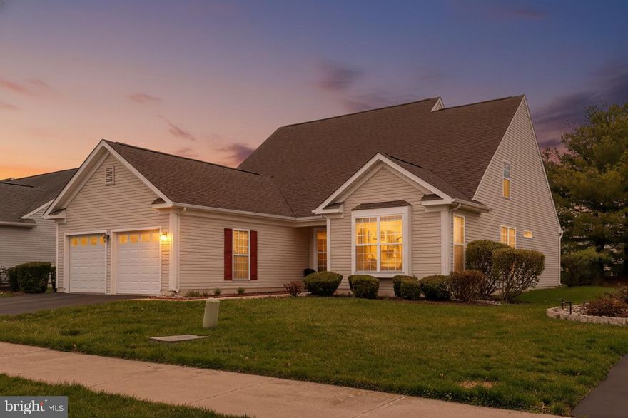 Enjoy easy main-level living in this beautifully designed home featuring 2 bedrooms, 2 bathrooms, and a 2-car garage in the sought-after Springmill 55+ resort-style community. The inviting layout offers a living room with a gas fireplace, plus a sitting room and dining room at the front of the home for added flexibility and charm. The spacious kitchen is well-equipped with a center island, abundant prep space, generous storage, and a sunny breakfast room.
The primary bedroom offers plush carpeting for comfort, while the laundry room includes a utility sink and extra storage space for everyday convenience. Upstairs, a versatile flex room provides the perfect space for guests, a home office, or hobbies. Step outside to the rear patio and enjoy the peaceful setting backing to walking paths and trees.
Springmill delivers the vibrant lifestyle you’ve been looking for, with a sparkling outdoor pool, tennis and pickleball courts, a clubhouse filled with social activities, scenic walking paths, and low-maintenance living that includes lawn care, exterior upkeep, and snow removal. All of this is just minutes from shopping, dining, and medical services in Middletown.