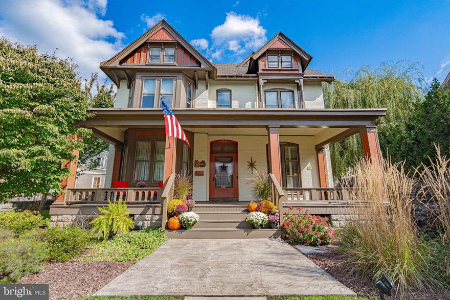 Within the North Side Historic District, on a wide and quiet street, sits a special Victorian built c. 1875. This Queen Anne-style home from the Gilded Age, which witnessed the rise and fall of Bethlehem Steel, has many one-of-a-kind features. Welcome guests on the expansive covered mahogany front porch, or relax in the seclusion of the back yard screened by evergreens and a privacy fence. Upgrades include a completely remodeled kitchen, primary bathroom, rebuilt deck and front porch. Some years in London and the discovery of a basement fireplace inspired the current owners to create an intimate pub with a private entrance. Noteworthy features include 11 foot ceilings, 6 beds, 4 fireplaces, 3.5 baths, original hardwood floors, a stained glass window, and off street parking options which include a detached garage and paver parking pad for 2-3 cars. Live within walking distance to fine dining, shopping, an array of cultural events and experience an unparalleled urban lifestyle. Just 3 blocks to Main St and a half mile to the D&L Canal Trail & Sand Island Park, now is your chance to be the next steward of this Christmas City storybook home that exemplifies every essence of luxury, elegance, and comfort.