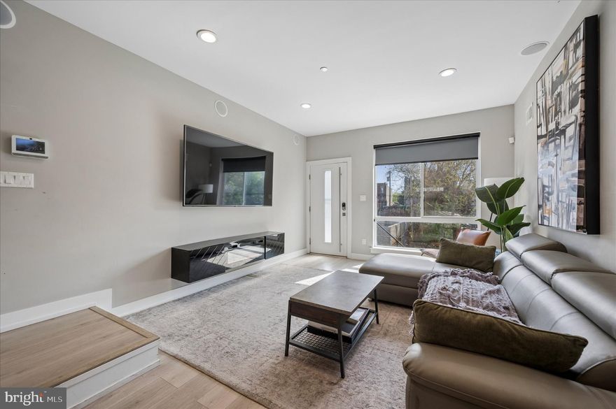 Modern living meets rooftop city views at 2242 N Reese Street. 

This well-maintained home offers the perfect blend of style, functionality, and investment potential—ideal for both homeowners and investors.
Featuring a spacious, light-filled layout, the home includes luxury vinyl plank flooring, a refreshed kitchen with modern appliances, and a clean, well-appointed bathroom. Generously sized bedrooms, comfortable living and dining areas, and updated mechanicals enhance everyday living.
Designed for both convenience and experience, the home is equipped with smart home technology, allowing you to control heating and air, locks, cameras, and the security system directly from your smartphone. In-wall Bluetooth speakers add a seamless, built-in sound system—perfect for entertaining.
The fully finished lower-level suite with a full bathroom offers flexible space ideal for a guest room, home office, or additional bedroom.

Step outside to a huge private rooftop with stunning skyline views, creating the perfect setting to relax or entertain above the city.
With approximately 5 years remaining on the tax abatement, this property also delivers strong financial appeal.
Located on a quiet residential block with convenient access to public transportation, Temple University, and major roadways, the home is just a 10-minute drive from Fishtown and Northern Liberties—placing you near top dining destinations like Suraya, Laser Wolf, Pizzeria Beddia, and Front Street Cafe, as well as La Colombe Coffee Roasters.

Move-in ready with strong rental potential, 2242 N Reese Street is a standout opportunity in a rapidly growing area.