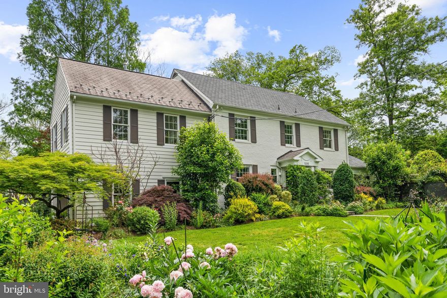 New Price!! Welcome to this stunning property located in the highly sought-after neighborhood of Edgemoor. This house is situated on a corner lot in a prime location, offering a perfect blend of modern living and timeless charm.  As you step inside, you are greeted by a spacious and inviting living area with walls of windows overlooking the gardens providing ample space for entertaining family and friends.  The gourmet kitchen boasts top-of-the-line appliances and plenty of counter space, abundant cabinetry, and a center island to make meal prep a breeze.  The interior has modern amenities ensuring comfortable family living and is lit with natural light.  The upper level houses 4 of the 5 bedrooms, including an owner's suite with a gas fireplace and washer/ dryer. The 3 family bedrooms are cozy and comfortable, providing the perfect retreat after a long day.  One of these bedrooms has a private in-suite bathroom, while the other two share an additional full bathroom.
The lower level contains the 5th bedroom with a separate entrance, kitchen area, and family room with fireplace.
Step outside to your very own backyard oasis, complete with a garden full of lush landscaping and a private patio, the perfect place to relax and soak up the sun on a warm summer day.
This property has everything you need right in the heart of Bethesda!