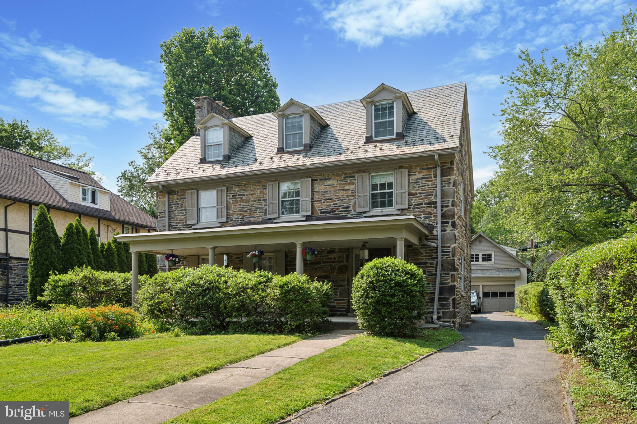 Welcome to 731 S Latches Lane, a distinguished stone colonial in the heart of Merion Station, with timeless charm, generous living space, and unmatched convenience. This elegant home has 6 bedrooms and 3.5 bathrooms, and blends classic Main Line architecture with easy access to Center City Philadelphia and the University of Pennsylvania.
The living room is perfect for both entertaining and everyday living. The formal living room features a wood-burning fireplace, ideal for cozy evenings or lively gatherings. The adjacent dining room is spacious for large gatherings. The kitchen features abundant countertops and wood cabinetry and has space for a small breakfast table for morning coffee and reflection.
A powder room and laundry room complete the first floor, the second level features four large bedrooms, including a primary suite with an en-suite bath. A full hall bath serves the remaining bedrooms. The third floor offers two additional bedrooms and another full bathroom—perfect for guests, a home office, or extended family.
The lower level includes storage, and flexible space for recreation or hobbies. Additional highlights include a detached garage, a private driveway, and a backyard with space for play, gardening, or outdoor entertaining.
One of the home’s greatest advantages is its exceptional location. Just a short walk to the Merion SEPTA station, commuting to Center City Philadelphia is fast and stress-free. University City institutions—including Penn, Drexel, and CHOP—are also just minutes away, making this home ideal for academics, medical professionals, or anyone working downtown.
Located in the top-rated Lower Merion School District and close to premier private schools, the home also offers proximity to local parks, shops, and restaurants along the Main Line and in nearby Narberth. Despite its central location, the neighborhood feels quiet and residential, offering a peaceful retreat with all the benefits of urban accessibility.
731 S Latches Lane is a rare opportunity to own a classic Main Line home in a truly unbeatable location. With its architectural character, spacious layout, and commuter-friendly setting, this is a place to settle in and stay for years to come.
