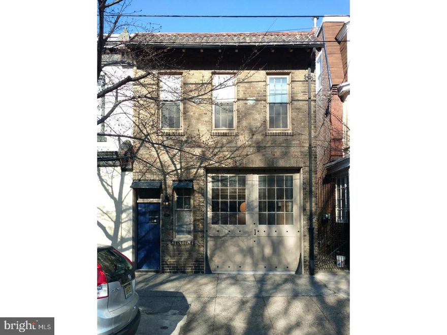 Incredible opportunity on a gorgeous tree-lined block in University City?AND located in the Penn Alexander School catchment!  Meet this c.-1880 carriage house zoned RSA5, and currently set up as an architect's office on the first floor plus a two-bedroom apartment on the second floor.  The unique buff brick fa ade complete with all existing original features including 10' tall carriage doors, clay tile overhang with exposed rafter tails, and metal and tile accents?a truly handsome building.   The garage door even has a curb cut!  Step into the foyer where you'll find a door into the office, or steps up to the apartment.  The office is a big wide open space with tile-floored conference area, exposed brick wall, 10ft ceilings and an abundance of natural light. There is a full kitchen complete with solid maple cabinetry, stainless steel appliances, tile backsplash, solid maple wood flooring and a pocket door into an all-tile full bath with stall shower. In the rear is an additional raised open area with two skylights and an exposed brick wall. This is currently used as an architect's office but has the potential for many different uses?endless possibilities!   The second-floor apartment begins with a 3 window wide living/dining room with 9ft ceilings, a large skylight and double closet. The full kitchen boasts solid maple cabinetry and all the features of the unit below, a bar counter and pendant lighting.  Continue back and you will find two bedrooms, a hallway laundry closet (full-size units) and an all-tile hallway bathroom. This unit is currently rented for $1200/month with a lease expiring on 10/31/17, however tenant can vacate if given 60 days' notice. Tenant pays for gas and electric, owner pays water. This is a fantastic opportunity to use and operate as an office and apartment, or to convert into a single family home in the very popular Penn Alexander catchment zone!  Don't miss on this historic house with its modern updates!