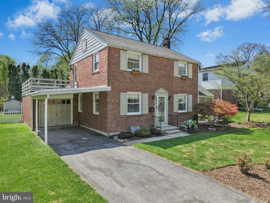 A quiet street in the Tremont Park neighborhood of West End Allentown is the setting for this cheery brick home on just under a quarter acre. Built in 1950, the house blends antique touches with seamless modern upgrades and offers more than 2,000 square feet of living space over three finished levels. 
Easy care wood-look floors and large windows accent spacious living and dining areas. The recently renovated bright eat-in kitchen elevates first floor living with features of quartz countertops, expansive prep and storage space, and an island with seating. The dining room opens to a sweet covered side porch, and the sunny family room leads to an additional covered patio and an expansive rear yard. Upstairs, three spacious bedrooms share an updated hall bath, one with access to a 2nd floor porch to enjoy sunshine views of greenery. A finished lower level, carport and attached garage are welcome amenities.