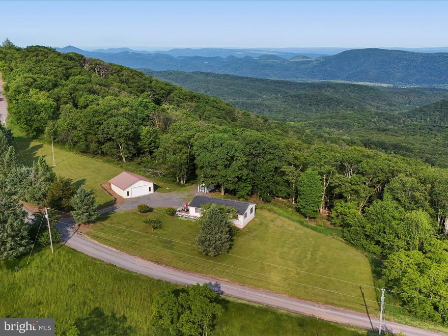 Welcome to your dream retreat in the rolling hills of West Virginia. this beautifully maintained single level 3-bedroom, 2-bathroom home offers the perfect blend of comfort, convenience, and country charm. Set on a generous 8+ acre, flat lot with a detached 30x30, 2-car garage, this property is ideal for those who love outdoor living and appreciate wide open space.
Step inside to find a functional floor plan with bright, open living areas and plenty of natural light. The spacious kitchen and dining area flow effortlessly, making entertaining a breeze. Three well-sized bedrooms and two full bathrooms provide ample room for family or guest, all on one easy-living level.
Outside the expansive yard offers endless possibilities-from gardening to bonfires or simply soaking in the peace and quiet. Wildlife often visits the property, making it a true haven for nature lovers, hunters, or anyone who enjoys watching deer at sunset. Enjoy private access to 10,000 acres of state game land for endless opportunities to hunt, hike or just enjoy nature.
Though it feels like a private escape, you're still just minutes from local amenities, shopping, and dining-giving you the best of both worlds.
Don't miss the chance to make this outdoor paradise your forever home. Schedule your showing today!