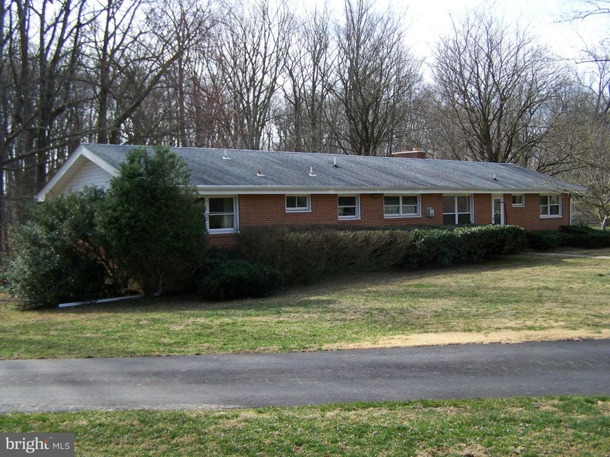 Picturesque setting priced to sell-Perfect for investor/renovation/possible subdivide or homeowner to renovate and have their own park. 3 separate parcels totaling 9.1 acres.Custom built home from an earlier era. Great bones with cathedral ceilings for that open air feel. Oversized 24x32 attached garage. Roof approx. 10 years, all systems in working order. Large shed for the toys. Sold as-is