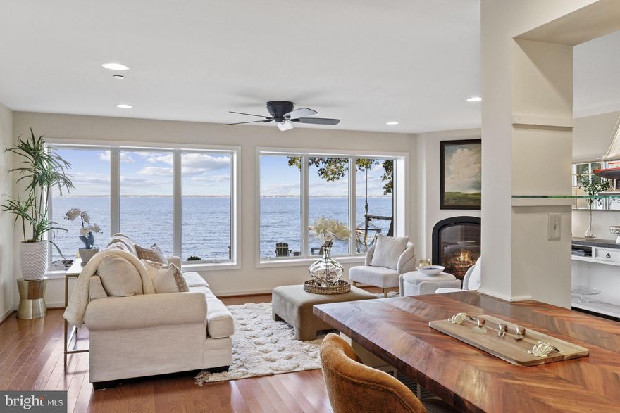 Experience Coastal Luxury on the Chesapeake Bay! Brought to market for the first time in over 70 years, this exceptional waterfront property in the highly sought-after community of Arundel on the Bay captures the essence of Annapolis coastal living. Perfectly positioned at an ideal elevation, the home enjoys unobstructed panoramic views of the Chesapeake Bay, the Bay Bridge, and the iconic Thomas Point Lighthouse.
As you approach down the private driveway, the breathtaking water views set the tone for what awaits. Step inside the welcoming foyer and be immediately greeted by sweeping vistas of the Bay. The main level features an open-concept design, ideal for entertaining, with a spacious kitchen and large island seamlessly connecting to the dining and living areas. The living room’s picture windows frame endless water views, while a cozy gas fireplace adds warmth and charm. Also on this level are a half bath, laundry room, pantry, and access to the attached one-car garage.
Upstairs, you’ll find three bedrooms, two full bathrooms, and a waterside office - all with captivating Bay views. The generous primary suite is a peaceful retreat, featuring large picture windows that maximize the views and an ensuite bath with elegant finishes.
Outdoor living is equally extraordinary, with spaces thoughtfully designed for entertaining or quiet reflection by the water. The full-width deck invites al fresco dining or morning coffee as you watch cruise ships pass and breathtaking sunrises unfold over the Bay. The seamless connection between indoors and out allows you to enjoy the ever-changing colors and moods of the Chesapeake year-round. A level, grassy waterside lawn leads to steps that take you directly to the water’s edge - the perfect place to savor the peaceful rhythm of waterfront life.
Beyond the home itself, Arundel on the Bay offers a lifestyle that beautifully blends waterfront charm with a strong sense of community. This historic neighborhood features a peninsula with calm-water boat slips, a community pier, a private beach, wooded walking paths, and a playground. Rooted in history and rich in tradition, residents enjoy seasonal and annual community events that foster connection and celebrate the Chesapeake Bay lifestyle.
Just ten minutes from downtown Annapolis, this property offers the perfect combination of tranquility, convenience, and timeless coastal appeal - a rare opportunity to own a legacy home in one of the region’s most desirable waterfront communities. Welcome Home!