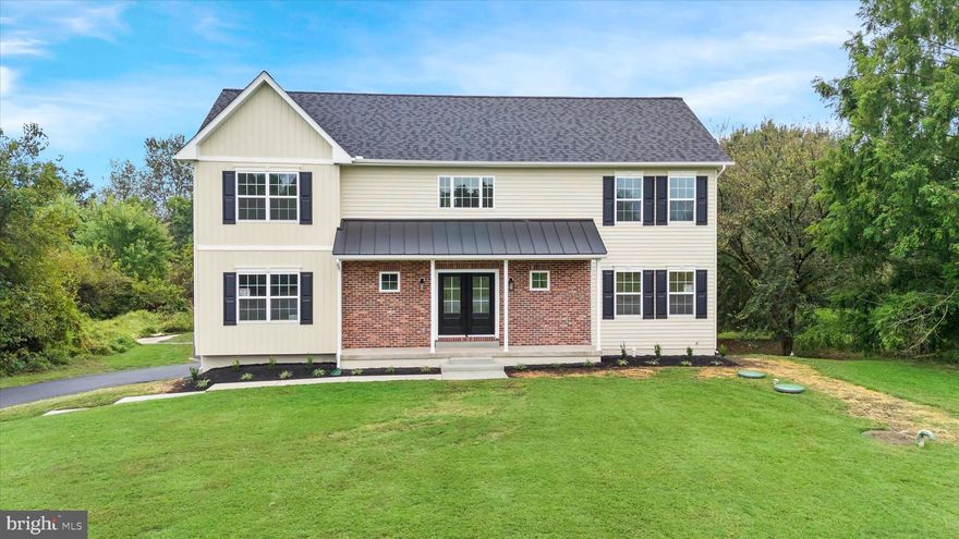 Don’t miss this opportunity to own a brand-new custom home on a 1-acre established neighborhood in Middletown, (you will not have to live through construction surrounding your home!)  Offering 3,428 sq. ft. of thoughtfully designed living space. This home blends luxury, functionality, and space for the modern lifestyle. Enter through the double front doors into an impressive two-story foyer, & stained oak stairs that sets the tone for the rest of the home. To the right, a formal dining room provides ample space for large gatherings and includes a butler’s pantry for added convenience. The main living area features a bright and open-concept kitchen and family room, complete with a propane fireplace and picturesque views of the surrounding land. The kitchen boasts a hidden walk-in pantry designed to impress and accommodate all your storage needs. Granite countertops, stainless steel appliances and a gorgeous island make this kitchen perfect. A first-floor bedroom or home office with a full bath adds flexibility for guests or remote work. Upstairs, the primary suite is a true retreat with a spacious layout, stand-up shower, soaking tub, double bowl vanity, and an 8’ x 8’ walk-in closet. Two additional generously sized bedrooms (with walk in closets), and a full hall bath complete the second level. The finished basement includes a half bath, walk-out access, and the option to customize a large family or recreation room while still offering ample storage space. Propane gas and a 2 zone heating/Cooling system make for a comfortable home. A rear-facing 2-car garage adds both privacy and curb appeal. Located only 6 minutes from the St Georges Bridge gives you the luxury to take RT 1 wherever you need to go. This home combines high-end features with peaceful surroundings—perfect for those looking for new construction with room to grow.