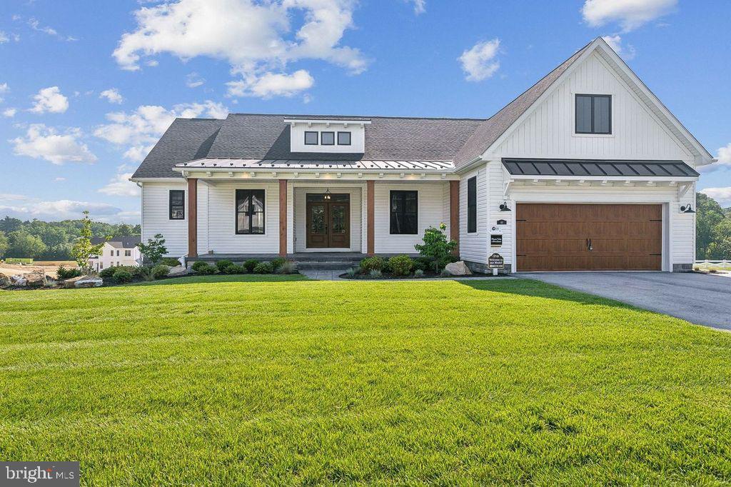 **TO BE BUILT*** Please stop by the sales center for details at 11 Flint Drive Hanover, PA 17331 CONTRACT NOW- $10,000 Closing Assist and $5,000 in options**Must use preferred title and lender**
***** ACTUAL MODEL IN NEARBY COMMUNITY TO TOUR!!**TO BE BUILT**
This Nash model features a very open floor plan, 3 bedrooms, 2 full bathroom, 2 car garage, 9' ceilings on main level, first floor laundry room, owners bedroom is on one side and the other bedrooms 2 & 3 on the other, tray ceiling in family room with windows in rear for a great view, dining/breakfast area is off kitchen with access to the back yard, large kitchen island, walk in pantry, granite countertops, 36"wall cabinets , open to family room, LVP flooring in foyer, family room, dining room, kitchen, and hallways. Spacious owners bedroom with walk in closet, owners bathroom with upgraded tile floor with tiled shower with seat, double sinks and linen closet, full basement for future use and much more!!
Close proximity to Long Creek Reservoir, Codorus State Park, and Shopping. Commuter Friendly and just minutes for the MD line.**! - Please note listing price is base price and may not be representative of additional options shown. All photos are of Model Home.