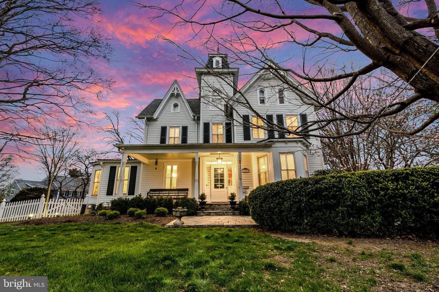 Step into this historic 1865 Victorian splendor, where luxury seamlessly intertwines with modern comfort. Recently renovated from the roof to the basement, this home invites you on an emotional journey through time. Experience the century of loving parties and memories within this impressive 5300+ sq ft of exquisite living space, nestled on an expansive .96-acre lot adorned with mature landscaping, including over 70 American boxwoods dating over 100 years.

Situated in the heart of a lush park, this home exudes unparalleled craftsmanship across two levels, overseen by the renowned Adams Architect in Alexandria. Boasting 4 bedrooms and 3.5 baths, the property offers an entertainer's dream on the main level, featuring a gourmet kitchen with a center island adorned with premium appliances. The formal dining and living room are ample to accommodate large parties, or transport yourself to the family room and dining room for more intimate gatherings by the fireplace. Enjoy the first-floor primary suite with ample walk in closet followed by a large primary bath. The second floor harbors 3 bedrooms and 2 fully renovated bathrooms and walk in closets. The third floor features two large rooms that could be easily transformed into 2 additional bedrooms, making the house a 6 bedroom total. One of my favorite touches is the attention to detail when redoing the roof, from the fishscale tiles on the Tourette to the identical replica of the spear. Be ready to fall in love with this majestic, one-of-a-kind historic property, where you can step out to the terrace and fenced yard to observe the numerous birds, native plants, and trees. Don't miss out on the opportunity of a lifetime to acquire a property that rarely goes for sale.