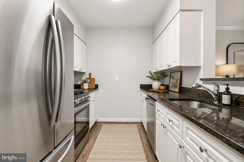 Photo of 2204 Westcourt Lane #317, HERNDON, VA 20170 (MLS # VAFX2311576)