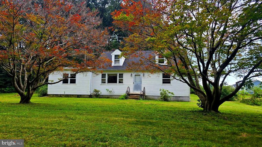 ***REDUCED***  Charming 4BR/1BA Cape Cod-style home situated on a private 0.5-acre lot in Spotsylvania. This well-maintained 1,244 sq ft property features a spacious family room addition, hardwood and tile flooring, central A/C, and efficient heat pump systems. Enjoy the peace of rural living with no HOA and A-3 zoning—perfect for added flexibility. Private well and septic. Convenient to Rt. 208 and Lake Anna amenities. Ideal for first-time buyers, investors, or anyone seeking a quiet countryside retreat with classic charm.