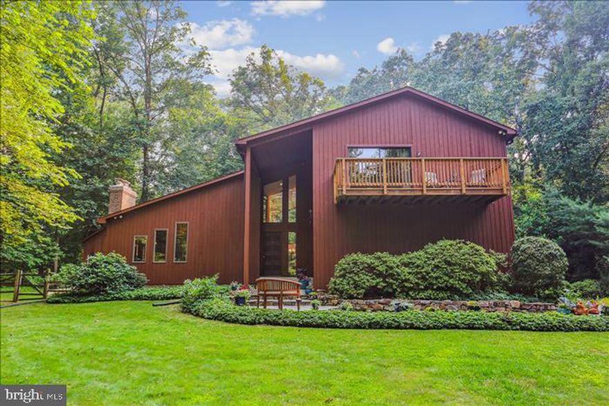 Welcome to this stunning almost 1.5 acre oasis of spectacular outdoor living space and fantastic flexible floor plan.  This gorgeous home hits the perfect balance of privacy and comfortable living and entertaining space.  This Contemporary style home boasts two story foyer, 3 bedrooms and 2.5 bathrooms with gleaming hardwood floors, recessed lighting, vaulted ceilings, two stone fireplaces,  eat-in kitchen with SS Appliances, walls of windows, two car oversized garage, full basement and much more.  Perfectly situated on a lush landscaped and fenced backyard lot with beautiful deck, gazebo and shed.  The home is minutes away from major commuter routes, parks, schools, shopping and restaurants.   Must have approved appointment to show - house is NOT vacant!  This property is truly one of a kind and you will not want to miss this spectacular oasis!  Call Agent with any questions.  OPEN HOUSE - Sunday, October 8th from 1 to 4