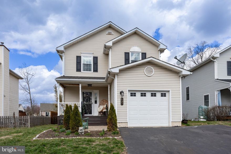 Move right into this beautifully updated and upgraded home!

Enjoy the outdoors rain or shine from the charming covered front porch. Step inside to a welcoming foyer with newer flooring that flows seamlessly throughout the first floor. The spacious living room and dining room, which features sliding doors to a large rear deck, offer plenty of space for entertaining.

The remodeled kitchen is a chef’s dream, featuring elegant cabinetry, granite countertops, a stylish ceramic backsplash, gas cooking, and large windows that flood the space with natural light.

Upstairs, the owner’s suite boasts a full bath and a walk-in closet. Two additional bedrooms and a full hall bath complete the second floor, with ample storage throughout.

The finished basement, complete with drywall and recessed lighting, houses the laundry/utility room and provides additional living space. A walk-up basement with sliding doors leads to the private, fenced-in rear yard.

Located near the end of a cul-de-sac, this home offers peace and privacy.

Notable updates include:

Flooring throughout the first floor (2018)

Roof replacement (2016)

Kitchen remodel with granite countertops and backsplash (2018)

Updated bathrooms

New HVAC system (2020)

Hot water heater and sump pump (2021)

Recessed lighting and new fixtures throughout

Don't miss this move-in-ready gem—schedule your showing today!