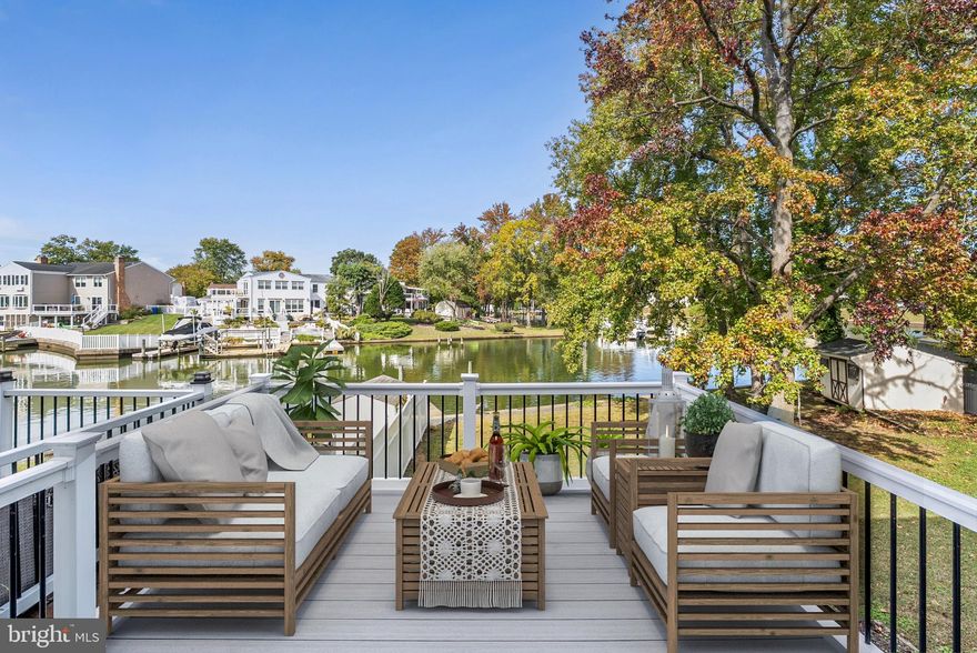 Welcome to this stunning waterfront home with a dock on a spacious, fenced-in yard with new deck overlooking it all - perfect for outdoor  & water activities! Just renovated from the new roof, down to the windows and luxury vinyl plank floors on the main & brand new carpet upstairs. The modern kitchen is equipped with gleaming granite countertops and stainless steel appliances, making it an ideal open concept space for cooking and entertaining that extends to the deck with the gorgeous view. All the bedrooms have walk in closets & the primary suite's bathroom also has a hall door for easy access for all occupants. With a large shed & driveway that fits 2 cars on a quiet cul-de-sac, this property offers privacy and functionality—plus, no mandatory HOA fees unless you want to be a part of the voluntary community recreation association for fun events with neighbors. Waterfront property will always rise in value so buy as an investment to live in, to rent for cash flow as tenants pay off your mortgage or air bnb & go enjoy your waterfront oasis when you want and rent out when you don't! Don't miss the opportunity to own this exquisite waterfront retreat! Furniture is not included & the pictures labeled virtually staged furniture is digital