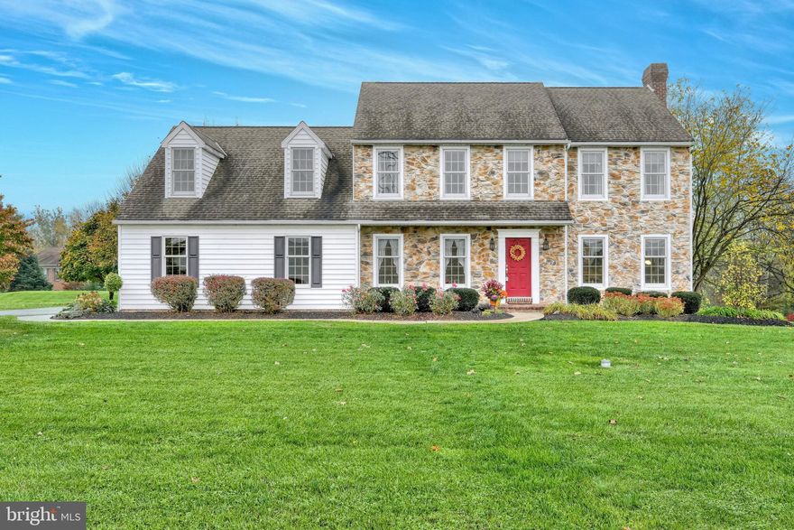 Privacy and quiet surround this home on almost 1.5 acres in sought after Dallastown school district.  This one owner Colonial style home has been well maintained and boasts pride of ownership. Custom Home built by Raymond Ziegler. The home features 4 Bedrooms and 2.5 Bathrooms. Traditional master bedroom suite with large walk in closet, tile floors in master bath with linen closet and double vanity. Two additional bedrooms with ample closet space in each and one large additional bedroom over the garage.  Eat-in Keener kitchen with island bar, SS appliances, large kitchen pantry, hardwood floors and walk out to the deck. Separate dining room with wainscoting and hardwood floors. Living room with fireplace features brand new carpet.  First floor powder room and laundry/mud room off of the aesthetically pleasing side load garage.  Oversized garage has plenty of room for workbench, storage and your tractor.   Other features include 9' ceilings on the first floor, central vac, hard wired smoke detectors and a large walkout basement ready to be finished into additional living space.