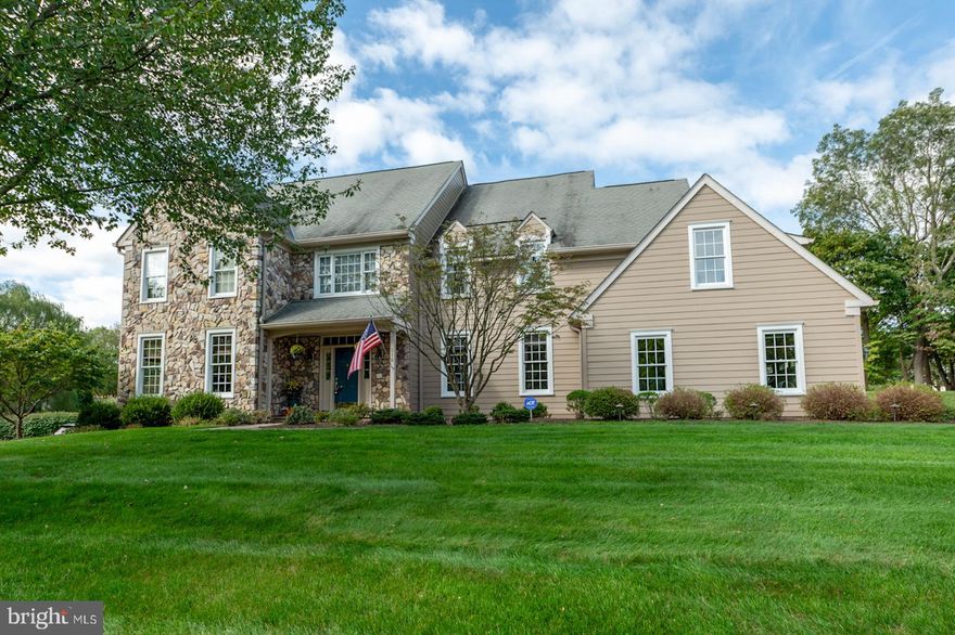 Welcome to 110 Rossmore Drive, a magnificent estate in the prestigious “Rossmore” neighborhood, where timeless elegance meets modern luxury. This spectacular sun-filled “Ashling” Model offers over 5,500 square feet of exquisitely finished living space, including 5 bedrooms, 4.5 baths, and a beautifully designed lower level. From the moment you arrive, the expanded driveway, paver walkways, and meticulous landscaped grounds set the tone. The striking Hardie-Board and stone façade, accent by new garage doors, creates a commanding first impression. Step inside to an expansive foyer with rich millwork, gleaming hardwoods, and custom built-ins that flow seamlessly throughout the home. The main level boasts a private office/library, elegant living and dining rooms, and a fabulous family room anchored by a soaring floor -to-ceiling stone fireplace. The gourmet kitchen is a chef’s dream, featuring premium cabinetry, granite countertops, ad a designer tile backsplash. The adjoining breakfast room opens to a stunning covered porch, offering a serene retreat overlooking the lush, private backyard—an ideal setting for effortless entertaining or peaceful relaxation. Upstairs, the luxurious primary suite is a private sanctuary with a sunlit sitting area, custom built-ins, generous walk-in closet, and a spa-inspired bath with a soaking tub and oversized shower. Four additional bedrooms and two full baths provide exceptional comfort and space. The 5th bedroom is above the garage with a walk in cedar closet and can be used as you wish. The finished lower level extends the lifestyle, complete with a full bath and abundant storage---perfect for recreation, wellness,, or guest accommodations. You will be grateful to have numerous updated systems like, HVAC, roof, Hardie Board, gutters, windows, water softener and filter, garage doors and the list goes on. Nestled in one of Malvern’s most sought-after communities, Rossmore offers both tranquility and convenience—just minutes from vibrant downtown Malvern, fine dining, shops, train station, acclaimed schools, East Goshen Park, golf courses and with easy access to the airport. 
A home of timeless beauty, crafted for luxurious living – welcome to Rossmore