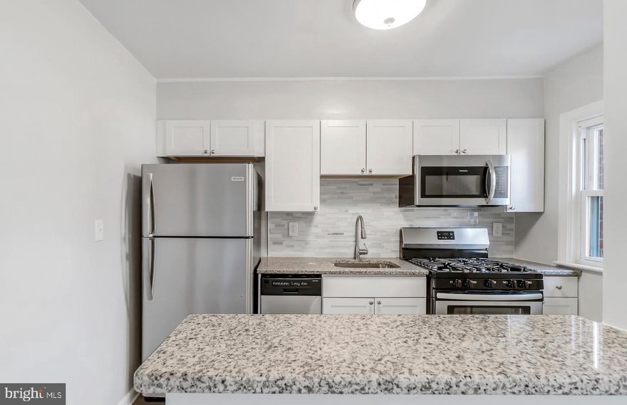 Welcome home to this charming and affordable gem! You don't want to miss this delightful  recently renovated and meticulously maintained 2 bedroom, 1 full and 1 half bathroom that exudes warmth and comfort, with spacious, light-filled rooms designed for modern living. Step into the stylish kitchen, with stainless steel appliances, sleek granite countertops, and a breakfast bar that creates the perfect space for cooking and gathering. this beautiful rowhome is conveniently located in the Middlesex community in Essex.  Enjoy the elegance and warmth of beautiful flooring throughout the entire house - laminate flooring in the upper level bedrooms;  in the family and dining rooms, tile in the kitchen and bathrooms and carpeting on the lower level. Step outside to a fenced-in yard, perfect for outdoor relaxation and entertaining.  Enjoy year-round comfort with efficient gas heating and central air-conditioning. Located in the vibrant town of Essex, this home gives you easy access to the Chesapeake Bay for boating, fishing, and water recreation. Essex also boasts parks, restaurants, and shopping options, making it a great place to call home. With quick access to major highways, commuting to Baltimore and beyond is a breeze. This townhome offers a perfect blend of style and functionality, ready to become your new home sweet home. Take advantage of this opportunity to make this townhome in the thriving Essex community your own!  Schedule your showing today!