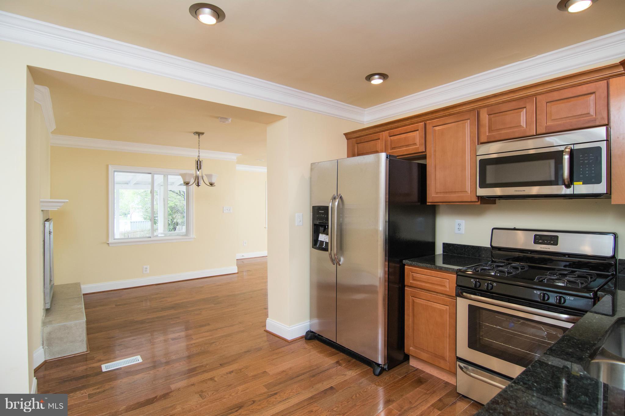 Last contract fell through due to financing. Well qualified buyers only! New hardwood floors, kitchen cabinets, granite tops, ss appliances, crown moldings, resets lights, dining room, and fireplace. All 3 full baths are new, Master w/ walk in closet master bath and sitting room. Basement has tile floor, bedroom, walk in closet & full bath. New Hvac, new porch roof, Fenced yard & more. Show n sell