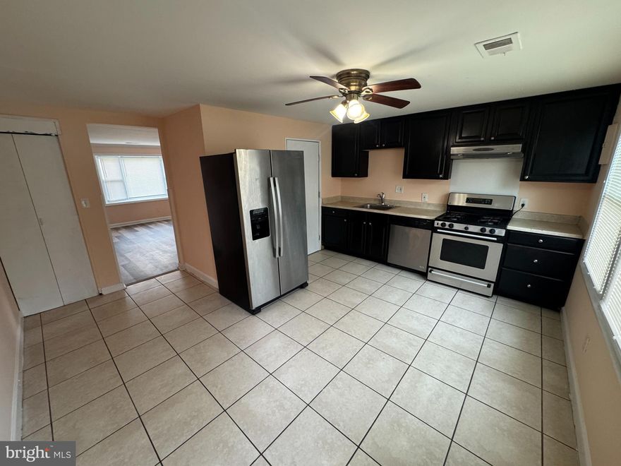 ***Vouchers Welcome***Recently Updated*** All Brick Front End unit townhouse  with 3 Bedrooms, 1 Full Bath located in Lakeland. Spacious living and Dining area area. Hardwood floor throughout the upper level, Updated Kitchen with Stainless Steel Appliances, Fresh paint, New Electrical light & Fixtures, updated bath. Open floor plan, lots of space for parking, and fenced backyard. Close to Silver Lake, Lakeland Park, Paca Street Park, Lakeland  Recreation Center, Patapsco Market and Middle Branch Patapsco River.