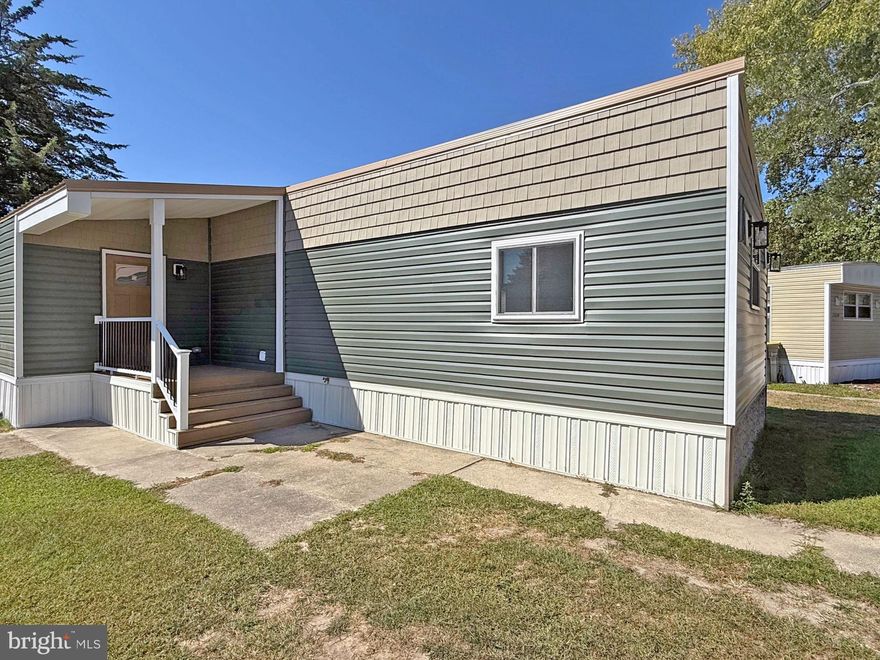 Marina community on Hazard Cove, which leads out to the Rehoboth Bay. Angola Beach & Estates has two community pools, two playgrounds, and some of the other amenities include tennis courts, basketball courts & kayak/canoe launch area. The marina has a boat ramp and plenty of parking spaces for your trailer (some slips for rent, but there may be a waiting list). The Rehoboth Beach boardwalk is approx. 10 miles away. This 1978 Marshfield has been completely remodeled inside and out! Spacious living room opens to the dining area and the kitchen. The kitchen has an island, a farm sink, and stainless steel appliances. The appliances include a fridge with ice maker, dishwasher, built-in microwave, and a garbage disposal. Large laundry room with a full-size, side-by-side washer & dryer, storage shelves, and a folding table. Main bedroom is en Suite with an armoire-style closet. The bath has a double-sink vanity with LED lighted mirrors, open shelving for your linens/towels, and a tub/shower. Bedrooms two and three are on the opposite side of the house for a split bedroom plan. The second full bath has a stall shower and single-sink vanity. Newer HVAC Pac unit. Newer exterior main electric panel (Delaware Electric Cooperative). Newer metal roof. Leasehold interest with Lot Rent of approx. $850/mt. (renews annually with any increases capped as per 25 Del. C. Sec 7050-70534. Lot rent includes water, sewer & trash/recycle. Homeowner pays electric, metered LP gas, cable/Internet/FiOS, and lawn service. The community owner requires an Application from the Buyer and all occupants 18-years-of-age or older, with acceptance based on: 1)Income Verification; 2)Credit Bureau Score (including debt-to-income ratio); 3)Clean Criminal Background Check. Leased-land properties do not qualify for conventional 30-year mortgages, but financing may be available to qualified borrowers from a few Lenders that specialize in installment/chattel loans for manufactured homes on leased land. Buyer will have the full 3.75% DMV Doc Fee as part of their closing costs & a settlement agent fee.