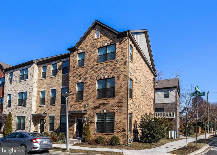 Bright and sunny end-of-group 4-level townhome in the Roland Heights in Medfield community. Like new! Luxury vinyl plank flooring in main living areas, wall-to-wall carpeting in bedrooms and loft. Entry level office or den with access to the 2-car garage and open staircase to the main level. Open flow main level with central kitchen, living room with sliding glass doors to deck, dining room and powder room. The kitchen features quartz counters and Frigidaire stainless steel appliances. The primary bedroom and bath share the upper level with 2 additional bedrooms, hall bath and laundry. A sunny and spacious top level loft or family room has sliding glass doors to a large deck. Easy commute to Downtown Baltimore and the suburbs. Close to Union Craft Brewing and the Union Collective, Johns Hopkins University, the Rotunda, fine dining on the Avenue and all the attractions of Hampden!