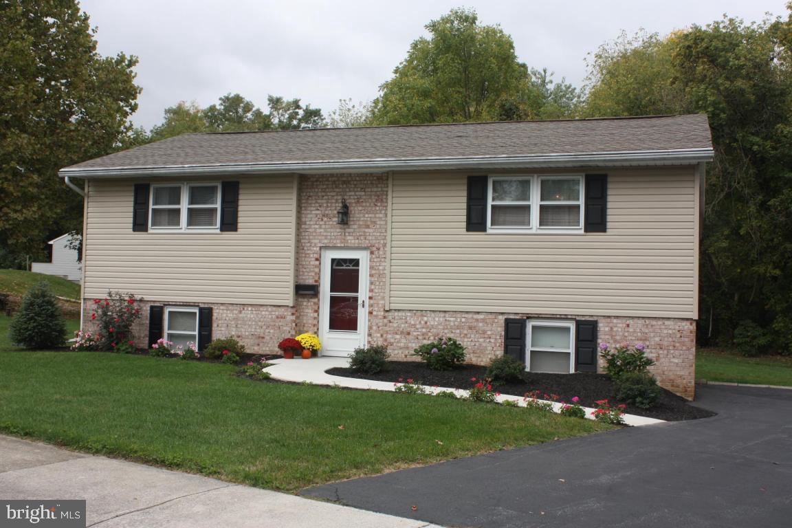 Move in ready-Updated & clean 3 bedroom, 2 bath bi level (3rd bedroom in lower level)-New kitchen w/stainless appliances-Updated bathrooms, flooring, paint-Spacious lower level family room-Utility room could be mudroom or storage area-This house is in very nice condition-Large 23x18 deck w/roof-Economical house in convenient location