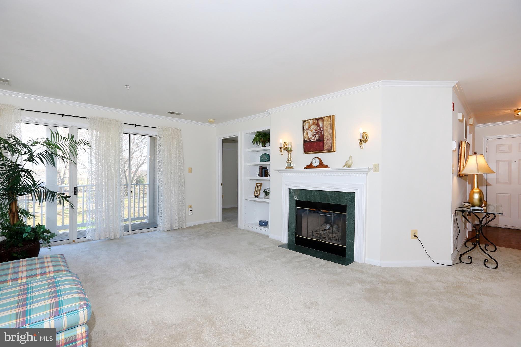 Bright unit w/ 2 master bedrooms. Open floor plan, Living room with built-ins and gas fireplace. Great kitchen with breakfast bar. Large wrap around balcony faces beautiful park. Updated furnace, a/c, HWH, and Full Size Washer and Dryer. Fresh Paint & Carpet Throughout. One block to great shopping and restaurants. Section 8 Welcome. Ask for link to apply online! Owner Requests Credit Score of 650+
