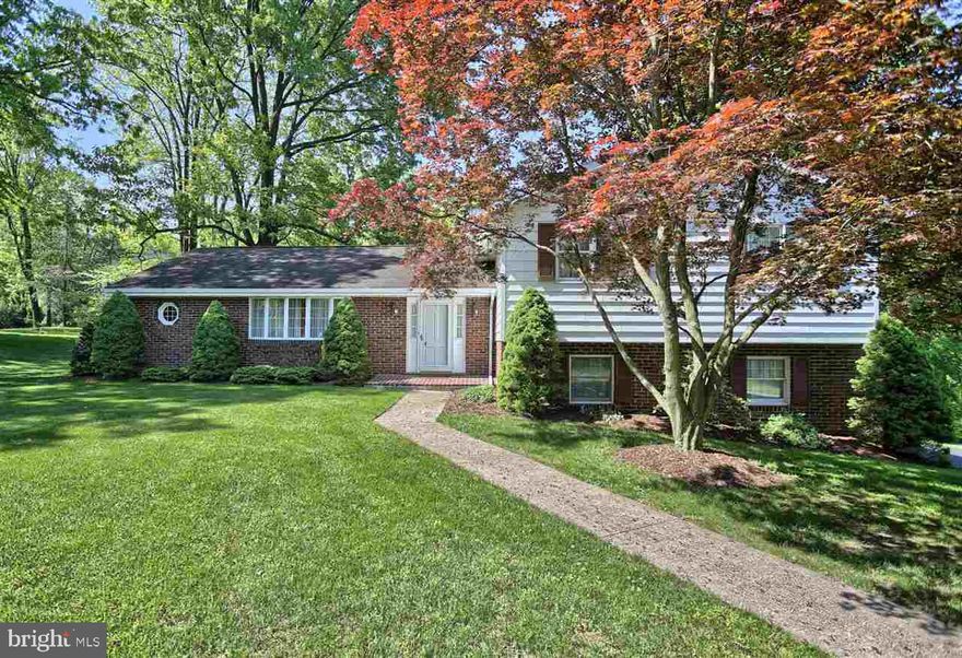 This massive home is never ending! There are 4 spacious bdrs, and 2.5 bths on the 2nd flr. The mstr suite has a 10?x6? walk in closet and full bth. The main flr features a living rm, w/ beautiful windows, eat in kitchen w/ access to back yrd, and formal dining rm. Also included in the home is a massive family rm, w/ gas fire place, and laundry rm. As an added bonus there is a den and workshop in the bsmt w/ access from the garage. Parking is no problem and there is plenty of space for outside entertaining.