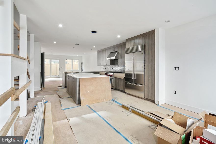 24 Foot wide new construction home with 2-Car Parking, Roof Deck, Elevator, Pending Tax abatement and amazing floor plan all within the Greenfield School Catchment in the Logan Square area of Center city Philadelphia. This home is 100% complete! Top of the line design and construction by the city's premier architect and developer. The designer kitchen has top of the line sub-zero and Wolf alliances, amazing stone counter tops and a huge deck for entertaining. In addition to the huge roofdeck there is also a very large deck off of the living room perfect for entertaining.Tall ceiling heights, smart home system, phenomenal views and more. Enter your new home through the 2 Car Garage with Private Driveway. 4 Bedrooms plus media room, additional office and additional play room.. 4 full Baths and 2 half baths. Finished Basement . Energy Efficient Dual HVAC Systems. Security Alarm with 2 Keypads. Video Intercom System & Home automation system. 8' Solid Core Interior Doors. Metal Handrails/Railings on Stairs. Wood Stairs with stained risers and treads.Tax Abatement Pending. Take advantage of this once in a lifetime opportunity while it still lasts. These homes are selling quickly... Come visit our showroom to view selections! . walk to the Comcast center, Rittenhouse, Fairmount Park, Riverwalk and more. Still time to customize and pick finishes. The home is framed, walk the floor plan! Check OPA for 2019 taxes due to possible citywide reassessment. private trash fee $22.50/mo  .pictures are of another unit in the same development