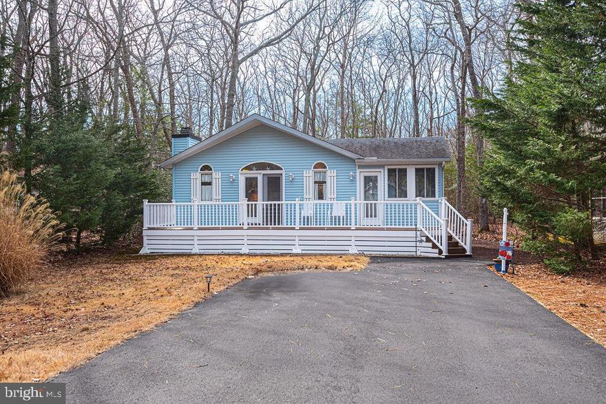 Enjoy the best of coastal living in this charming and well-maintained three-bedroom, two-bath home! One of its standout features is the inviting sunroom—perfect for relaxing year-round—along with a private rear yard that offers a peaceful retreat. Inside, vaulted ceilings create an open and airy feel, complemented by a cozy fireplace in the living area. The primary suite boasts a spacious walk-in closet, and there’s also a linen closet for extra storage. Lovingly owned and maintained by the same owners for 22 years, this home also features an encapsulated crawlspace which is conditioned with a dehumidifier, the roof is only  6-7 years old, and a new water heater installed in 2024, along with updated plumbing pipes and fixtures. Two sheds provide ample storage, and a front deck offers another great spot to enjoy the outdoors. This well-cared-for home is ready for new owners to make it their own! Furniture Negotiable.