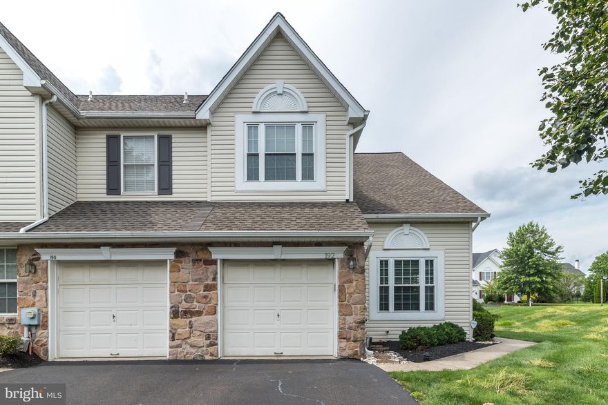 Welcome to this desirable end townhome in the well-established Warrington Hunt community. A charming curb appeal invites you into a bright foyer, flanked by formal living and dining rooms. Vaulted ceilings in both the foyer and living room add an airy, spacious feel, while rich hardwood flooring enhances the dining room and entryway.

The heart of the home features an open-concept kitchen with raised-panel cabinetry, granite countertops, and a peninsula perfect for casual seating or keeping the cook company. The family room is open to the kitchen and boasts a ledgestone fireplace surround with a block mantel. Just off the kitchen, a spacious and private deck provides a great outdoor retreat. A powder room conveniently completes the main level. Showings start Sunday, July 27th.  Open House 1:00-3:00 pm 

Upstairs, the open hallway overlooks the foyer with elegant railing detail. The primary suite boasts cathedral ceilings, dual closets, and a large en-suite bath with dual sinks, a separate shower, and newer laminate flooring. Two additional bedrooms, a hall bath, and a laundry room round out the second floor. Ceiling fans in all bedrooms add year-round comfort.

Looking for more space? The finished basement features an industrial style with painted beams, drywall, and laminate flooring—ideal for a home gym, media room, or flexible living space.