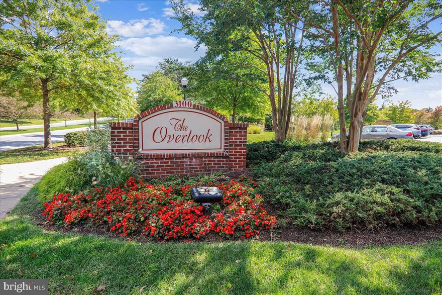 This is the best unit in Leisure World!  This fantastic 1700+ square foot corner residence offers living space and views beyond compare.   The unit includes a PRIME INDOOR PARKING SPOT #113  down the steps right next to the unit, on the lobby level AND EXTRA STORAGE #51 on level P2.   Multiple exposures with large windows overlooking the golf course and views of nature are truly one of a kind.  With two Bedrooms + Den (can be 3RD BEDROOM), an EXTRA Half Bathroom plus Two Full Bathrooms and an in unit Laundry Room, this special property gives you an abundance of comfortable living space with plenty of room for all your visitors, furniture and belongings.  Enter to a grand marble foyer that leads to an expansive living room with a fireplace. A separate Dining Room leads to  a table space Kitchen with oversized windows and verdant views to the outdoors.  The enclosed sunroom/balcony overlooking the golf course is a delight.  Located on the 2nd floor and immediately adjacent to the staircase, you have easy access in and out of the building.  There are also three elevators for your use.  The unit includes an indoor parking spot #113 on the lobby level and a storage room #51, level P2.  The Overlook is a lovely sought after building with many of its own social activities and an on-site, always helpful property manager. The Leisure World Community offers transportation, security, club houses with restaurant, golf, pools, tennis, walking paths and more and is located close to the ICC, medical offices and shopping.   Experience the best in easy living and a full social calendar in this popular 55+ gated community.