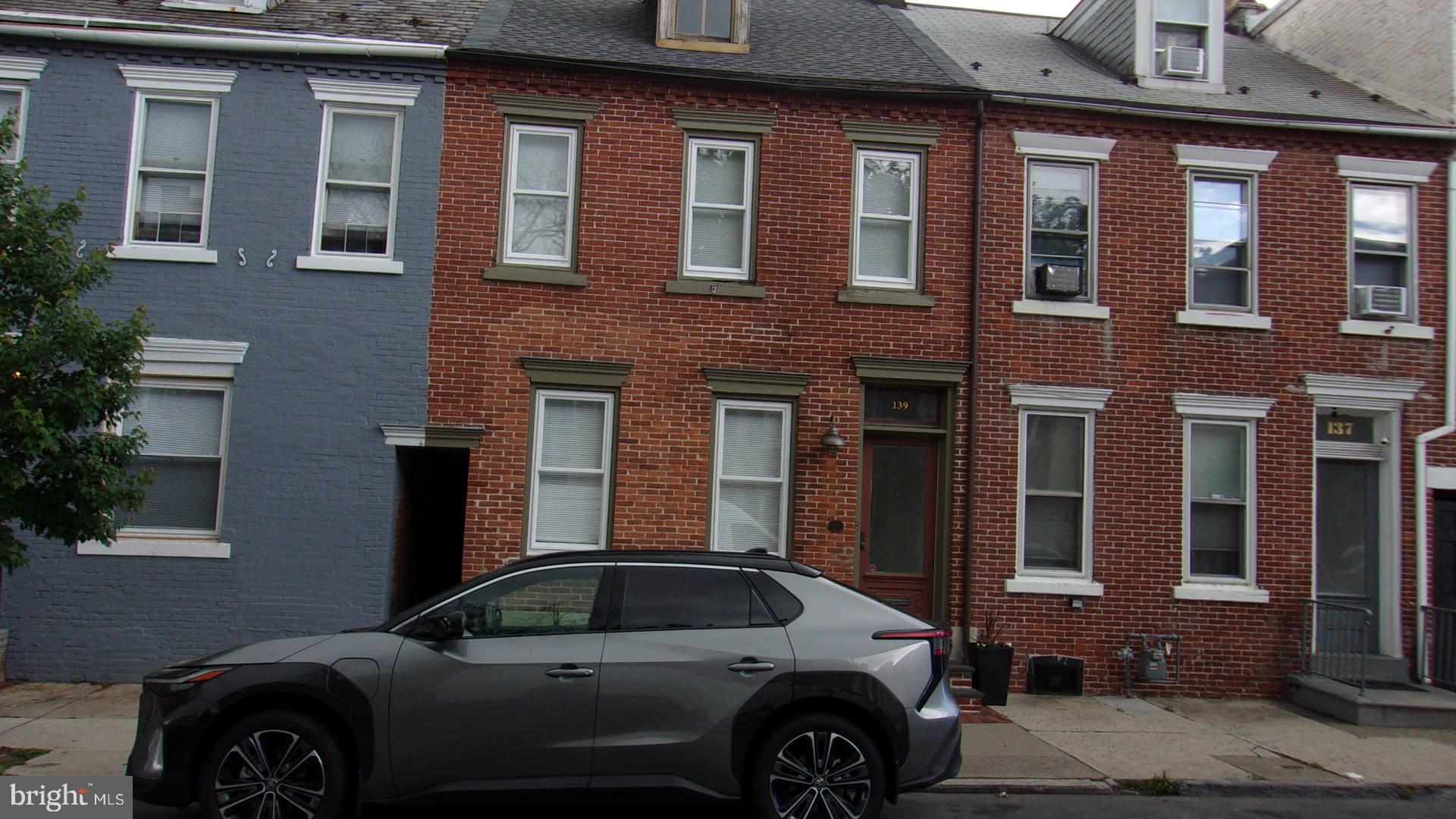 This is truly a diamond of a property in the center of Historic Allentown. From the spacious living room to the well-lit, beautiful kitchen and floors that transition from hard wood (all original except for the front bedroom) to low maintenance kitchen vinyl, you will be amazed at the layout of the first floor which has a full bath as well. There is a new garage door, and the opener is Wi-fi capable. In the basement, you have heated floors (as well as the first floor) and a spacious laundry room. The second floor touts a main bedroom with cathedral ceiling, skylights, ceiling fans and the balcony off the primary bedroom overlooks a multilevel outdoor patio with a fireplace, cable TV hook-up, banquet seating. The private yard has adjustable illuminated fence lighting. Culminating in a one and a half car garage. The bath has a jetted tub and a pedestal sink. Need room for clothes, there is a walk-in closet perfect for that. Need more storage, the attic is perfect or is ready to be finished into another room. Ceiling fans in almost every room keeps the air flowing. A definite must-see for any homebuyer. Close to many downtown attractions and restaurants. New lower HVAC.