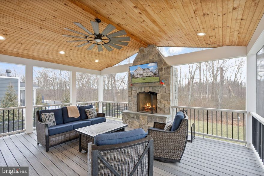 There’s a feeling you get the moment you arrive.

It begins at the front porch of the Longwood model by NV Homes—quiet, inviting, unhurried. The kind of place where mornings start gently, coffee in hand, with nothing but birdsong and fresh air to keep you company.

Inside, the home unfolds with an easy elegance. Wide-plank engineered hardwood floors stretch across the main level, grounding each space in warmth, while soft, natural tones create a sense of calm that carries throughout.

The dining room is ready for celebration—intimate dinners, holidays, long conversations that don’t need a reason. Nearby, the family room centers around a gas fireplace, offering a relaxed, comfortable space that naturally draws everyone in.

At the heart of it all, the kitchen is both refined and welcoming. An expansive island invites gathering, the walk-in pantry keeps everything within reach, and the sunlit breakfast area sets the tone for effortless mornings. Just beyond, a private office framed by French doors offers a quiet place to focus when needed.

And then, the transition outdoors feels seamless.

The screened-in deck becomes its own retreat—anchored by a wood-burning stone fireplace and surrounded by the soft sounds of nature. It’s the kind of space that turns evenings into rituals.

Back inside, thoughtful design continues with a custom mudroom that keeps daily life organized without sacrificing style, connecting easily to the three-car garage.

Upstairs, each bedroom offers comfort and privacy. One features its own en-suite bath, while two are connected by a well-designed Jack-and-Jill. The laundry room is exactly where you want it—right where life happens.

The primary suite is where everything slows down. Airy and expansive, with space for a quiet sitting area, it feels like a true retreat. Two walk-in closets provide room for everything, while the bath is designed to restore—dual vanities, a soaking tub, and a glass-enclosed shower with dual heads and a built-in bench.

The lower level adds another dimension to the home. Whether it’s hosting, relaxing, or simply spreading out, this space adapts beautifully. An additional bedroom and full bath make it ideal for guests, while direct access to the backyard reveals a private setting framed by mature trees.

This home doesn’t just check every box—it creates a lifestyle.

One that feels peaceful, connected, and quietly luxurious.

Welcome to Willowsford – The Greens.