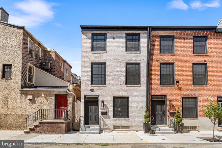 Welcome to 1941 Waverly, a seamless blend of new and modern with tasteful notes of timeless elegance. Perfection. Tucked away on a quiet, tree lined street just steps from both Rittenhouse and Fitler Square, this FULLY RENOVATED home has it all including 4 bedrooms, 4.5 bathrooms, a ROOF DECK, finished basement, amazing rear yard,  approved 10 year TAX ABATEMENT, and one year of prepaid parking! Notice this is not just another renovation immediately as you enter the home by spotting luxurious finishing touches including the gorgeous wide plank, white oak herringbone flooring, masterfully curated white oak stairwell wall, and coffered ceilings in the kitchen. Open floor plan on the first floor is an entertainer's dream. Head back to the perfectly designed kitchen to find a high end appliance package (Wolf/Bosch), integrated refrigerator and dishwasher, an oversized island, and custom cabinetry. The connecting, and partially covered, large back patio is a dream which includes a built-in gas grill, gas powered fireplace, stone pavers and a turf area. The second floor has all of the essentials including two bedrooms - one with an en-suite bathroom, and a second hall bath. Beautiful custom tile selections in both bathrooms. The enormous primary suite on the third floor includes another full length white oak wall detail, a large custom-fit walk-in closet, laundry, and an amazing black and white spa-like bathroom including a custom double vanity, oversized shower with bench, and water closet. Powder room on this floor to service the roof deck at the top of the steps. The finished basement with bedroom and extra living space completes the home. Walk score off the charts here as it is minutes to all of the city's top restaurants, shopping, parks and public transit. Walkable to 30th Street Station if you need to head to NY for work or fun. Take a look at this concession free home today! **Additional upgrades include: Dual zoned HVAC, 3rd floor and rear additions, all new plumbing and electrical lines, all new windows, Ring doorbell, Nest thermostats, 1 yr prepaid parking in nearby lot with acceptable offer.**