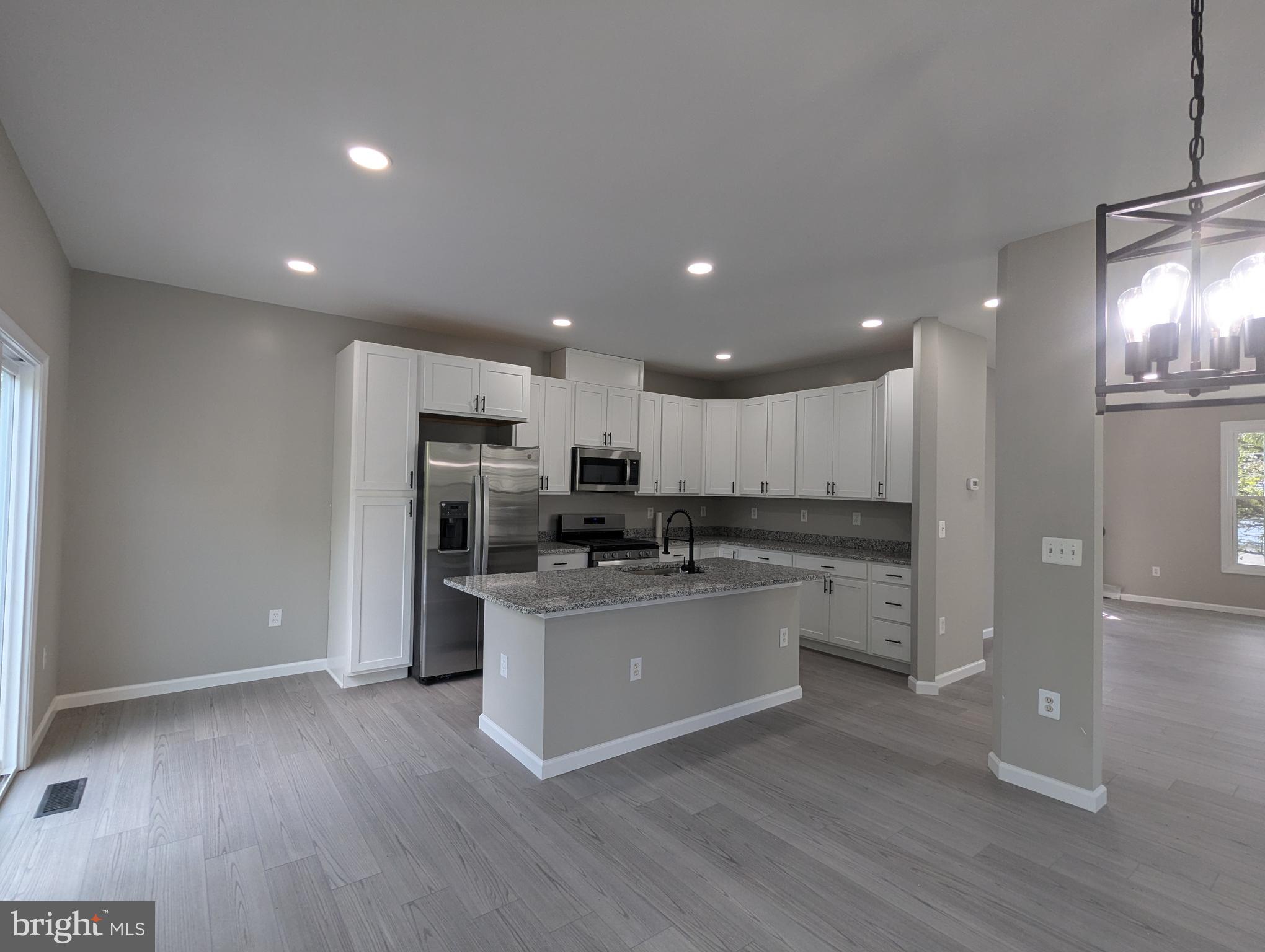 Featuring a huge end-unit townhouse in “NEW” conditions inside & outside, elegance and comfort. It’s just gone through the latest updates in 2024 with stunning quality. Three finished-levels, contemporary outside & modernized inside with over 2400 sf living space, 4 bedrooms (three on 3rd level, one in basement), 3.5 bathrooms. Main/2nd level is very spacious w/ open floor plan through-out living room, dining room, & kitchen light filled with a large island and breakfast bar. Deck off the kitchen open to a wooded area in the rear. Master suite with high ceiling, walk-in closet and updated shower; 2 additional bedrooms and a full (hall) bathroom and a laundry room on this 3rd level. Finished walk-out basement includes a 4th bedroom, a full bath, and a very spacious family/recreation room. Rear deck overlooks a private fenced backyard. Amenities include community center with pool, clubhouse, tot lots, tennis courts. Conveniently located just minutes away from Quantico Marine Base and commuter routes. Rental applications processed through RentSpree: https://apply.link/VgmezlA
Disclosure: Listing Agent is owner. Availability: Oct-01-2025. *** NO pets accepted ***