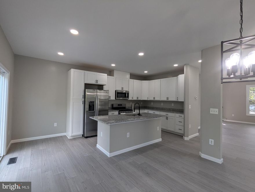 Featuring a huge end-unit townhouse in “NEW” conditions inside & outside, elegance and comfort. It’s just gone through the latest updates in 2024 with stunning quality. Three finished-levels, contemporary outside & modernized inside with over 2400 sf living space, 4 bedrooms (three on 3rd level, one in basement), 3.5 bathrooms. Main/2nd level is very spacious w/ open floor plan through-out living room, dining room, & kitchen light filled with a large island and breakfast bar. Deck off the kitchen open to a wooded area in the rear. Master suite with high ceiling, walk-in closet and updated shower; 2 additional bedrooms and a full (hall) bathroom and a laundry room on this 3rd level. Finished walk-out basement includes a 4th bedroom, a full bath, and a very spacious family/recreation room. Rear deck overlooks a private fenced backyard. Amenities include community center with pool, clubhouse, tot lots, tennis courts. Conveniently located just minutes away from Quantico Marine Base and commuter routes. Rental applications processed through RentSpree: https://apply.link/VgmezlA
Disclosure: Listing Agent is owner. Availability: Oct-01-2025. *** NO pets accepted ***