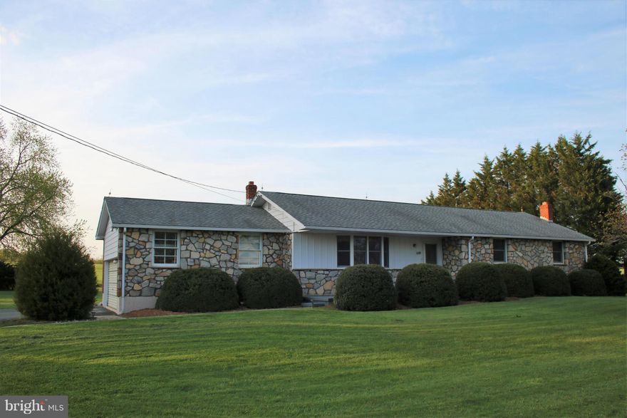 Peace and Quiet.  Beautiful brick and stone ranch on a large open lot. Across the street from the canal and backs to farmland. Wood floors, open living and dining room with large windows to watch the ships go by.  OR relax on the back porch and enjoy the wide open space.