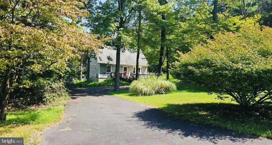 THIS SPACIOUS AND VERSATILE HOME FEATURES A FULL BASEMENT AND TONS OF EXTRA LIVING SPACE-- PERFECT FOR GAME NIGHTS, OFFICE SPACE, GUESTS OR JUST RELAXING. FRESHLY PAINTED INSIDE AND OUT, WITH A NEWLY STAINED DECK AND LANDSCAPING IT IS DESIGNED FOR ENJOYING EVERY SEASON! Check out this beautiful 3 bedroom, 3 bathroom home with a bonus room nestled in a cul-de-sac on 2.53 acres, offering both privacy and convenience located right here in the heart of the Poconos! Step into your brand new kitchen with beautiful quartz counter tops, brand new stainless steel appliances, all new lighting with open-concept living spaces with plenty of natural sunlight! Walk outside on your wrap around deck to enjoy the quiet surroundings and wildlife. Located minutes away from all local shopping centers, parks, libraries, ski resorts, casinos and restaurants yet tucked away in a quiet setting. This home offers the perfect blend of comfort and privacy! Don't miss out on this incredible home with extra acreage!