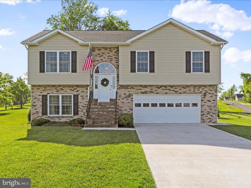 SELLER STILL ACCEPTING BACK UP OFFERS!  COME CHECK THIS HOME OUT! Welcome to your dream home in the heart of Harvest Hills, Romney, West Virginia! Nestled in a picturesque and highly sought-after neighborhood, this split foyer gem awaits its new owners. Situated on a sprawling corner lot, just shy of 1 acre, this property boasts an abundance of outdoor space, offering privacy and great views of the surrounding mountains.  Step inside and be greeted by the timeless charm of this classic home. With a traditional floor plan featuring 3 bedrooms and 2.5 baths, there's ample space for both relaxation and entertainment. The large kitchen is a chef's delight, adorned with granite countertops and top-of-the-line appliances.  The dining area seamlessly blends into the open-concept design, creating a warm and inviting atmosphere for family meals and socializing. Hardwood flooring adds a touch of elegance and durability to the space, while sliders provide easy access to the deck, ideal for alfresco dining and soaking in the scenic views.  Downstairs discover a fully finished basement, offering additional space for expansion and enjoyment. Whether it's a cozy family room, a home office, or a recreational area, the possibilities are endless.  For added convenience and security, this home features a 2-car garage with interior access, ensuring comfort and peace of mind year-round. A separate large laundry room adds practicality to everyday living, making chores a breeze.  The prime location of this home offers easy access to shopping, dining, schools, and medical facilities, ensuring that all your needs are just moments away.