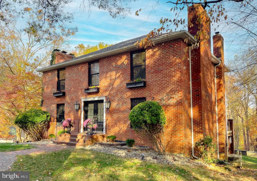 THIS COUNTRY CHARMER Has so much to offer.  ALL BRICK Home sits on almost 9 acres with oversized 2 car garage, Barn with 5 stalls, electric and and water, fenced areas.  Updates include Roof (2024),  FRONT Windows (2023), FRONT Door (2024),  remodeled Primary Suite with large Walk In Closet, Outside Retaining Wall with steps.  This property offers a fully finished walk-out basement, hardwood floors throughout, eat-in kitchen, dining room, mud room area, and so much more.  Property sits at the end of cul-de-sac and offers privacy yet close to everything.  Sit on your patio, deck, or around a firepit and enjoy the scenery and peacefulness.  The Basement offers room that can be a bedroom, office, playroom, workout room, whatever you want it to be.  So much to offer, Do no miss this one.