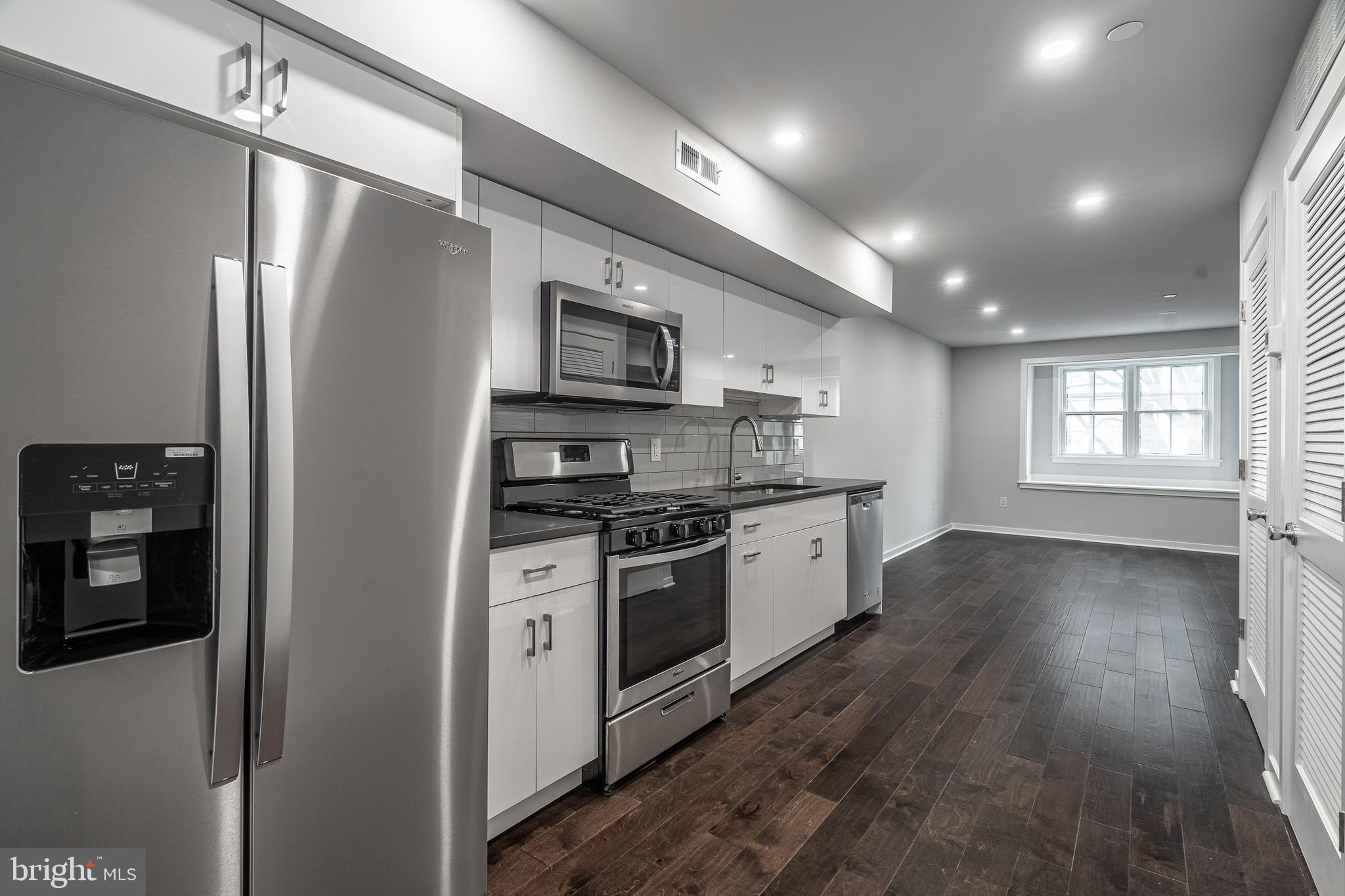 A fabulous 1 LARGE bedroom flat, new construction unit in Bella Vista you need to see! This fantastic property includes all the features on your wishlist, including Hardwood floors, quartz countertops, stainless appliances, large private patio and large windows for tons of natural light. The unit immediately welcomes all with its modern and inviting kitchen, complete with stainless steel appliances. Don't wait, schedule your showing TODAY!!!