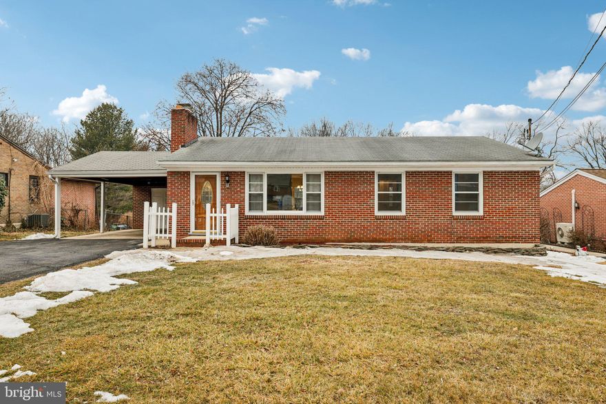 Well-maintained all-brick ranch offering classic charm, thoughtful updates, and flexible living space inside and out. A welcoming covered front entry opens to a bright living room with hardwood floors, neutral paint tones, and abundant natural light. The updated kitchen features crisp white cabinetry, modern hardware, tile backsplash, durable countertops, black appliances, and wood-look tile flooring that flows into a generous dining area—ideal for everyday living and entertaining. Hardwood flooring continues through the bedrooms, each offering ample closet space and ceiling fans. The full bath is clean and well-kept with updated fixtures and neutral finishes. The finished lower level expands your living space with recessed lighting, fresh flooring, and a versatile layout perfect for a recreation room, media space, home office, or hobby area. A dedicated laundry area and additional storage space provide functionality, while the unfinished section offers flexibility for a home gym or workshop setup. Step outside to a spacious brick patio overlooking a large, level backyard with mature trees and plenty of open green space. Whether relaxing, entertaining, or enjoying outdoor activities, this yard offers room to spread out and make it your own. Move-in ready with space to grow—this home blends comfort, updates, and outdoor potential in one inviting package. A new roof will also be installed prior to closing.