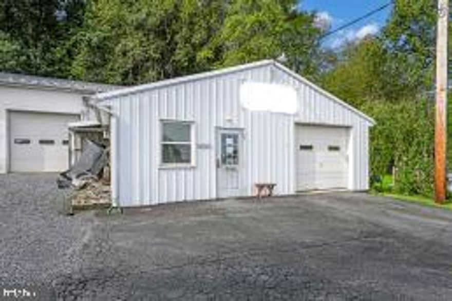Turn Key Successful Auto Business and Home.  The shop is 4,410 Sq. Ft. built in 2004, with 9' - 14' ceiling heights, spray booth, electric lift, three overhead doors, two restrooms, an office, 6" reinforced cement, radiant heat in the floors and central air. This is a well known and successful business for sale along with a recent remodel 1,238 S.F. Cape Cod Style home with eat in kitchen, dining room, living room, 1st floor laundry room, 3 bedrooms,(1 is a walk thru bedroom) 1.5 updated bathrooms with walk in tile shower, newer heating system, central air, central shop vac system, a detached oversized 2 car garage with storage.  .74 acres of land with macadam and gravel areas for storage. This property is mixed use zoning for a Investment opportunities.