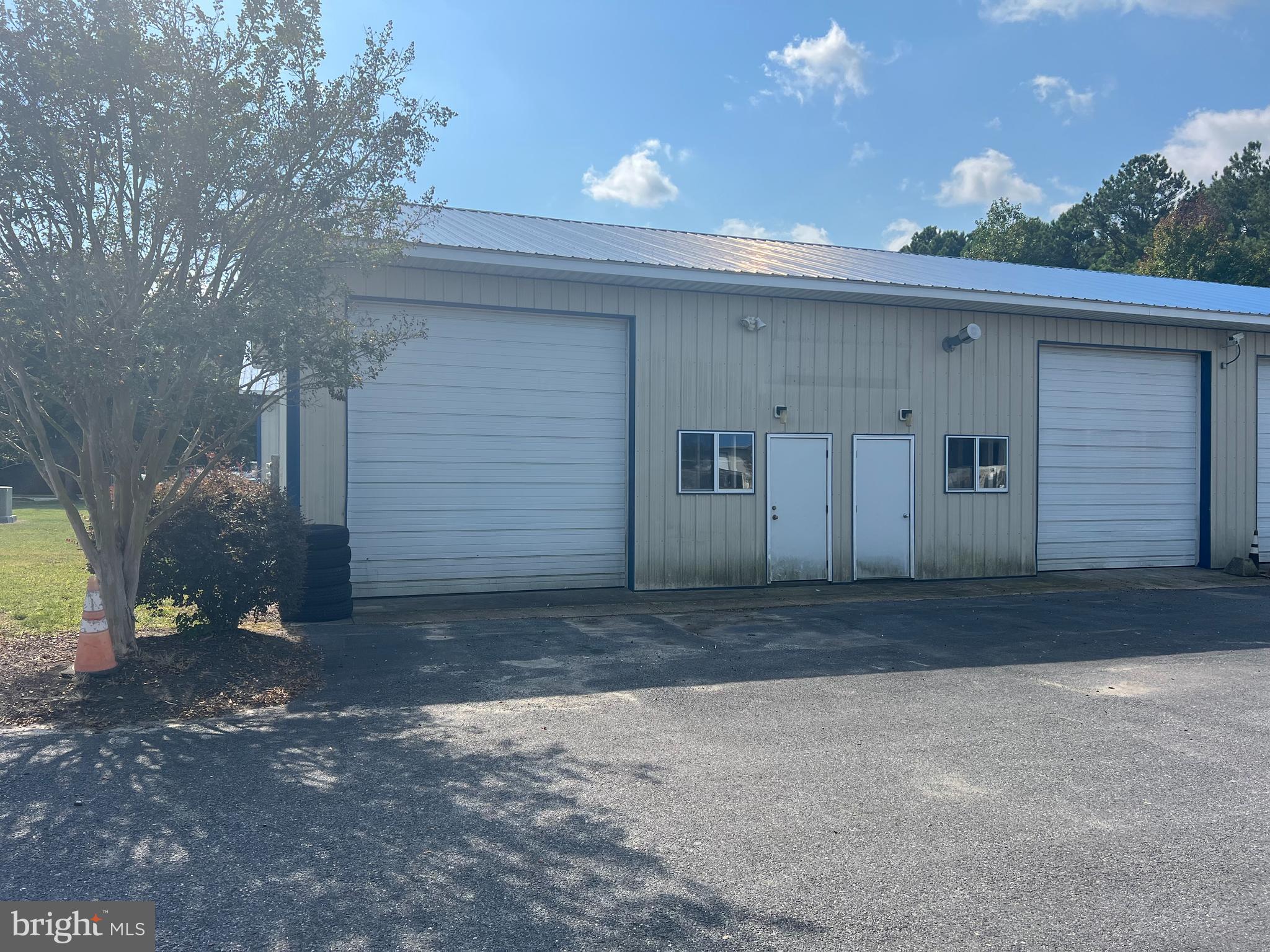 This 2100 square foot unit of clear span warehouse is under 10 minutes to Ocean City and 15 to Fenwick. If you have a business that serves the beaches and surrounding areas this space is perfect. It is located in the highly coveted "west of 113" corridor, and could easily have a small office if needed. This double unit has two 12'x12 roll up doors as well as two entry doors in the front and two in the rear with 13+ ceiling heights