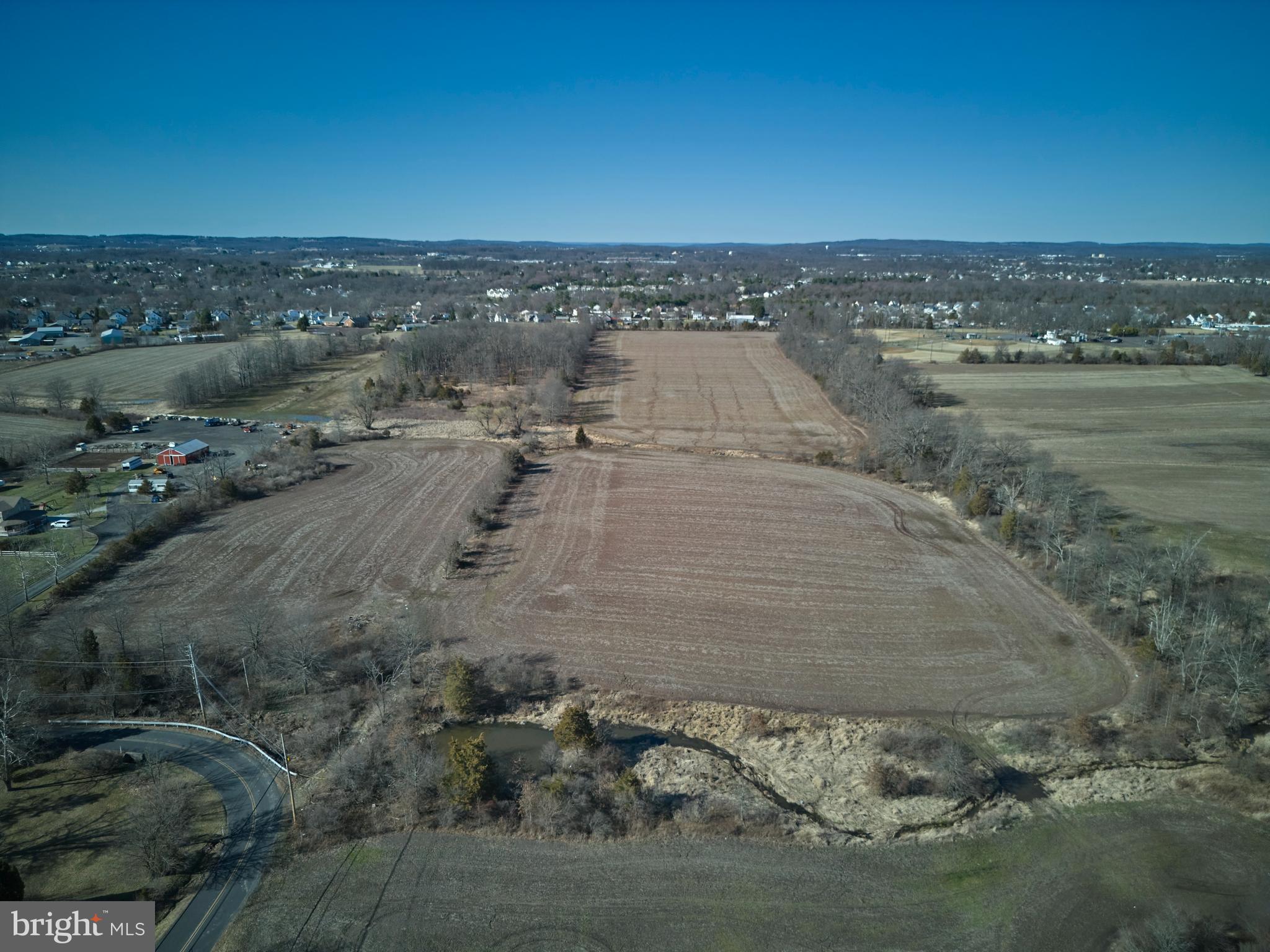 This pristine 36-acre parcel offers endless possibilities in a picturesque setting, ideal for equestrian pursuits, livestock, or agricultural use. The land features levelled, open topography and is currently being farmed, providing an excellent foundation for a variety of ventures. Located within the highly regarded Quakertown School District, this property offers the perfect backdrop for your vision.
Whether you're dreaming of creating private estates, establishing a small farm, or developing an equestrian center, this property offers both serenity and convenience. The land is also a potential candidate for subdivision, giving you the flexibility to build a collection of homes or a secluded community.
Convenient access to major Routes – Close to shopping, dining, and essential services.
Secluded, private setting – A peaceful and tranquil environment to escape the hustle and bustle.
Potential for subdivision – Explore development opportunities to bring your vision to life.
This beautiful land offers an unmatched blend of peaceful countryside living and proximity to all the amenities you need. Whether you’re looking to create a serene homestead or pursue a development project, the possibilities are abundant. Currently under Act 319 with possibiity to build on 3 sites, each 10 acres with no tax impact. Contact the listing agent today for more information and to schedule a showing.