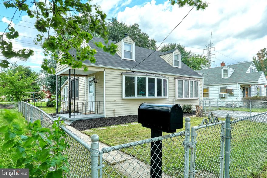 Beautifully remodeled cape cod includes new soft close kitchen cabinets, granite counter tops and a ceramic backs plash. Also included are new stainless steel appliances and recessed lighting. Freshly painted throughout, large double bay windows, upgraded 3 1/4 inch hardwood floors and new plush wall to wall carpet in all bedrooms.Conveniently located laundry room off kitchen with  washer and dryer and water resistant LVP flooring. Located just steps from water.