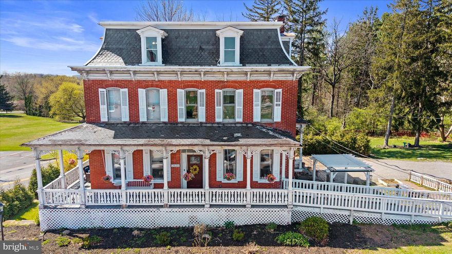 Step into history with this one-of-a-kind, fully renovated 8-bedroom, 6-bath estate — the former Anstine Hotel — nestled on over 2 private acres in Red Lion Area SD. Boasting over 5,000 sq ft of thoughtfully updated living space, this landmark property blends timeless character with modern convenience. The fully finished lower level features a complete in-law/apartment suite with its own kitchen — perfect for multi-generational living or rental income. A whole-home elevator and full wheelchair accessibility make this home truly livable for everyone. Enjoy the charm of a historic York County treasure, a small barn for storage, and sweeping privacy — all fully move-in ready for its next chapter. A rare opportunity that simply cannot be replicated.